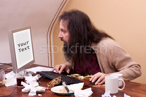 Nerd looks at monitor with space for text Stock photo © Pasiphae