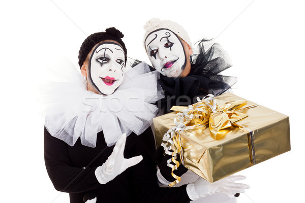 a couple clowns with a golden present Stock photo © Pasiphae