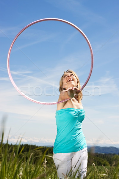 pretty blond mature woman enjoys her leisure Stock photo © Pasiphae