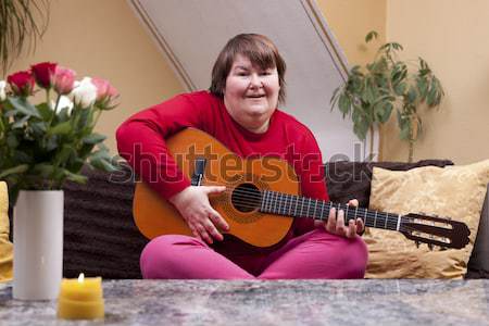 özürlü kadın gitar mutlu çiçek Stok fotoğraf © Pasiphae