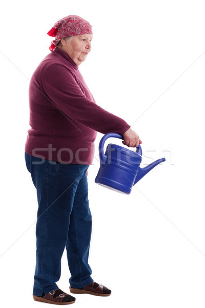 Senior holding a watering can 2 Stock photo © Pasiphae