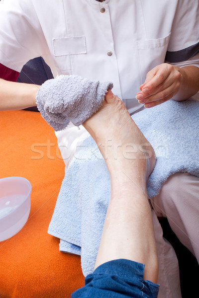 nurse washes the foot of a patient Stock photo © Pasiphae