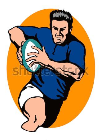 Stock photo: Rugby player running with ball