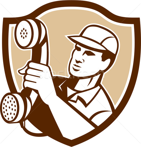 Telephone Repairman Holding Phone Shield Stock photo © patrimonio