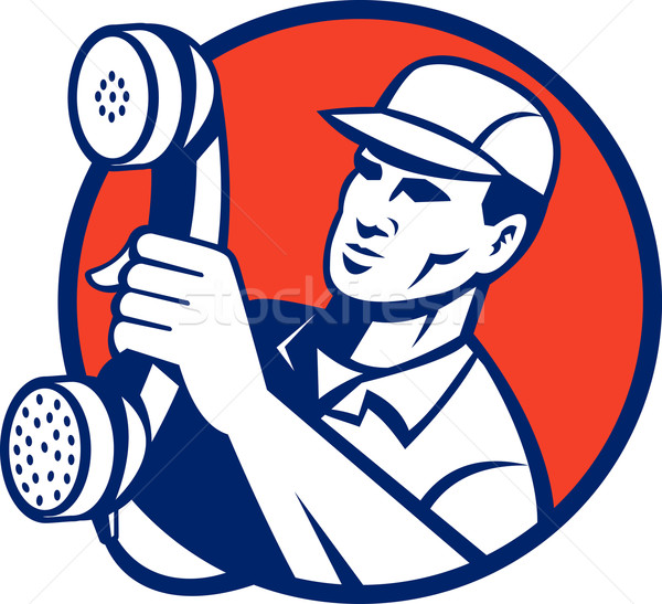 Telephone repairman holding out phone Stock photo © patrimonio