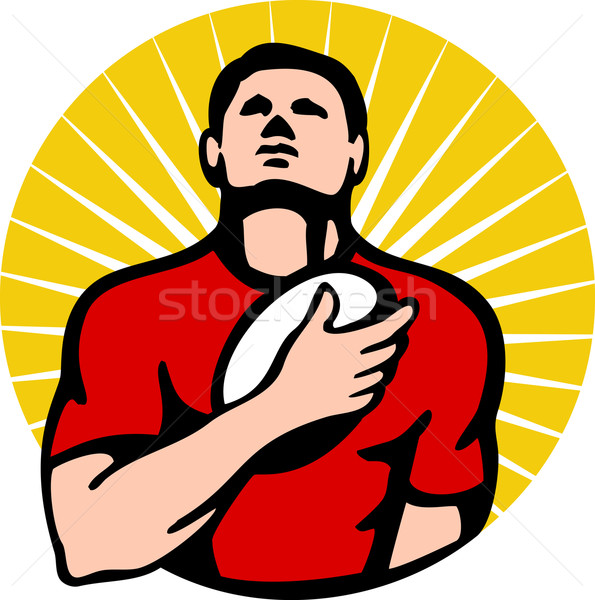 rugby player holding ball on breast Stock photo © patrimonio