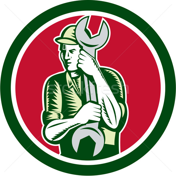 Mechanic Holding Spanner Wrench Circle Woodcut Stock photo © patrimonio