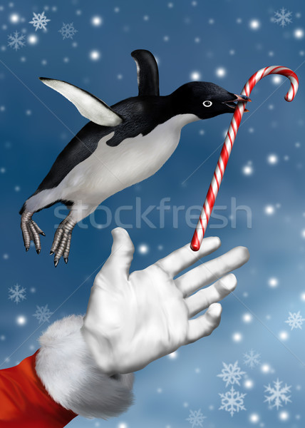 Christmas pinguin snoep riet hand Stockfoto © paulfleet