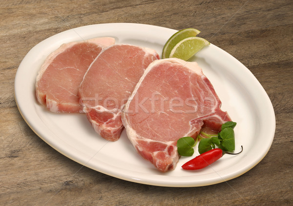 Porc herbes bois dîner viande steak Photo stock © paulovilela