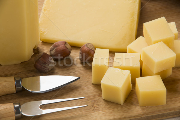 parmesan cheese on a cutting board. Stock photo © paulovilela