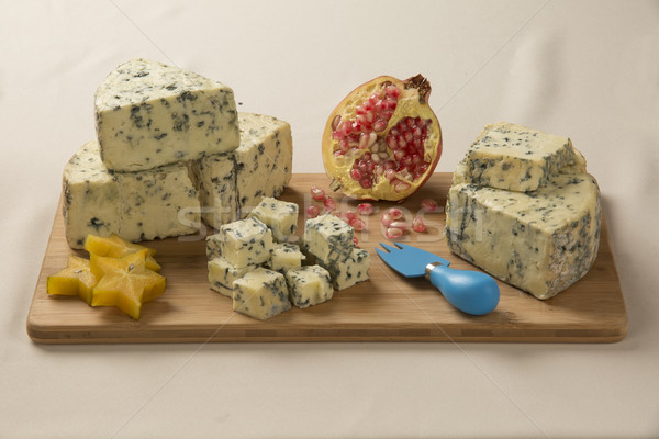 Blue cheese on wooden background. Stock photo © paulovilela