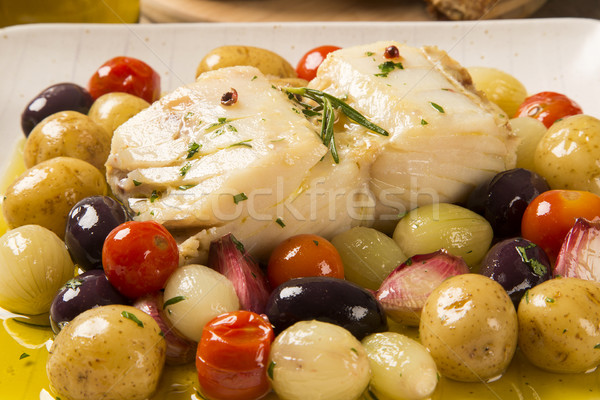 A typical Portuguese dish with codfish called Bacalhau do Porto. Stock photo © paulovilela