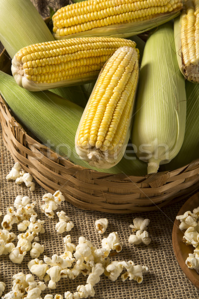 Corn maize and popcorns combined on a table.  Stock photo © paulovilela