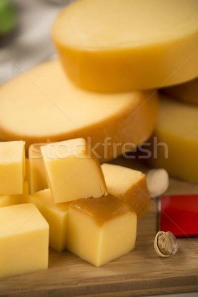 Italian provolone on wooden board Stock photo © paulovilela