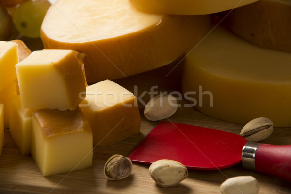 Italian provolone on wooden board Stock photo © paulovilela