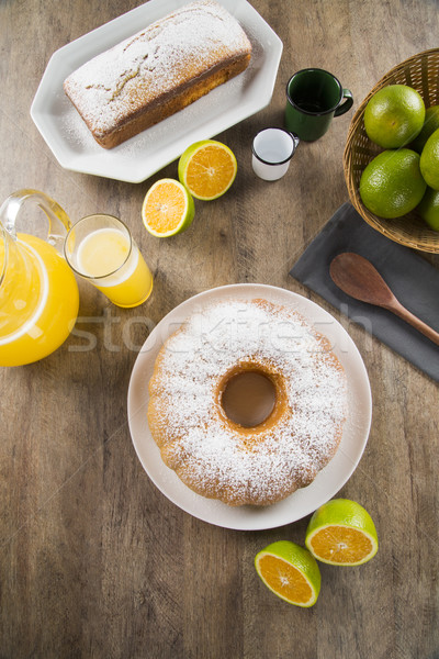 Orange gâteau table fruits jus fond Photo stock © paulovilela
