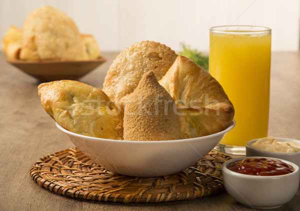 Mixed Brazilian deep fried chicken snack,, esfihas and pastry. Stock photo © paulovilela