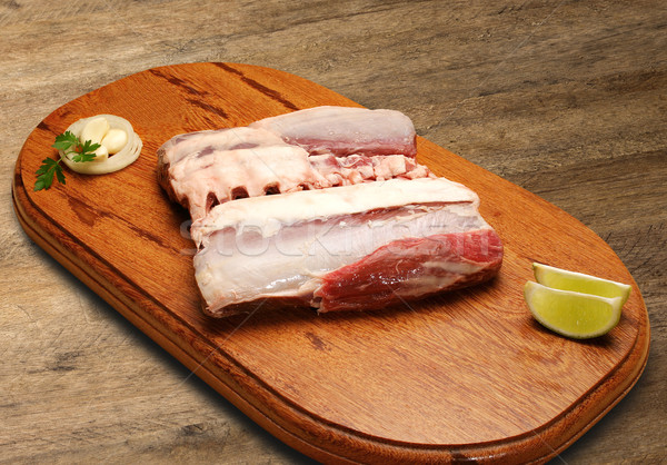 Surowy mięsa deska do krojenia rynku zielone Zdjęcia stock © paulovilela