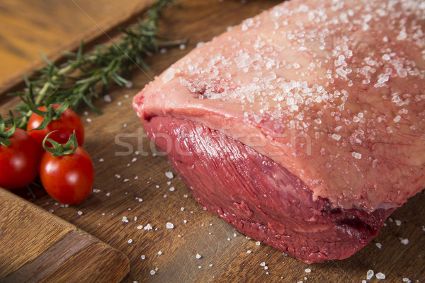 Nyers steak fa deszka paradicsom piros hús Stock fotó © paulovilela
