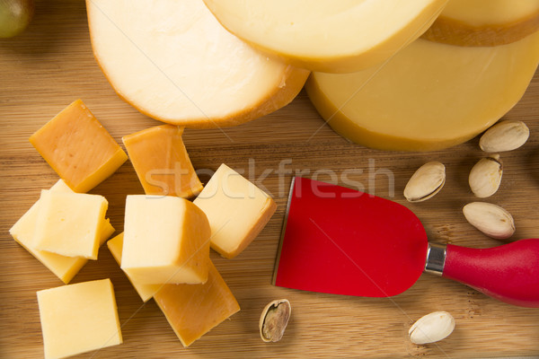 Italian provolone on wooden board Stock photo © paulovilela