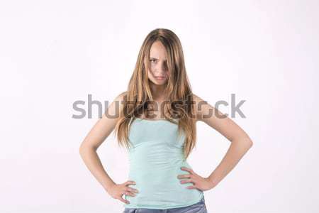 Offended young woman Stock photo © Pavlyuk