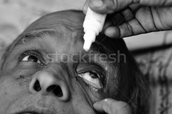 Szem cseppek öreg gyógyszer női törődés Stock fotó © pazham