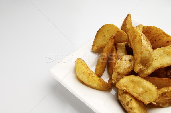 fried potato wedges Stock photo © pedrosala