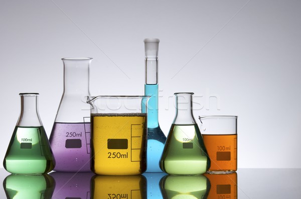 Foto stock: Laboratório · equipamento · líquido · cor · fundo · laranja