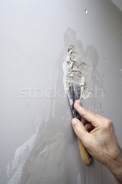 Foto stock: Reparación · daño · yeso · pared · gris · pintura