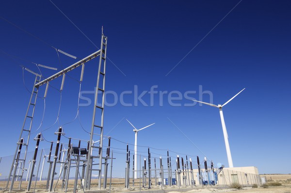 Centrale elettrica alta tensione cielo blu fabbrica energia futuro Foto d'archivio © pedrosala