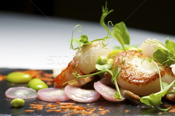 Piglet scallops and prawns. Stock photo © pedrosala