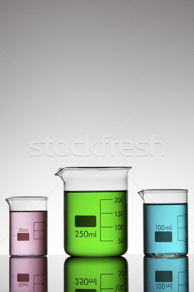 Trei colorat lichid luminos alb sticlă Imagine de stoc © pedrosala