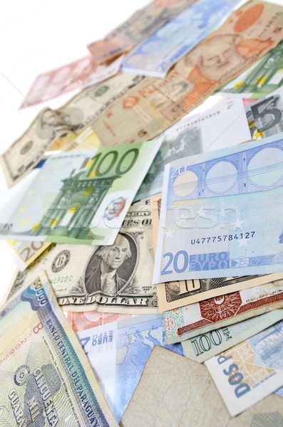 Moneda grupo billetes diferente países alrededor Foto stock © pedrosala