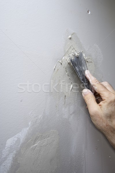 Naprawy uszkodzenie gipsu ściany szary farby Zdjęcia stock © pedrosala