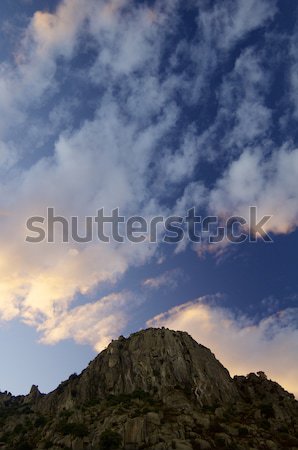 clouds and hill at sunset Stock photo © pedrosala