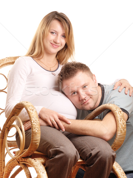 Mutlu hamile çift sandalye yalıtılmış Stok fotoğraf © pekour