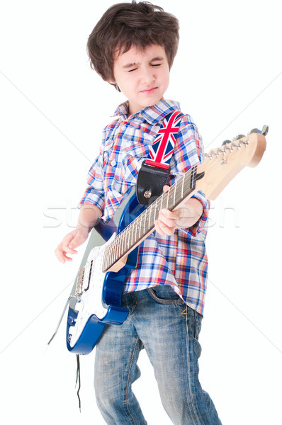 Little boy britpop style with electoguitar eyes closed Stock photo © pekour