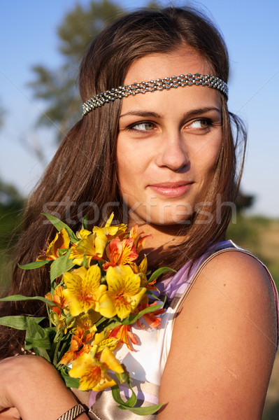 Hippie girl with lily outdoors Stock photo © pekour