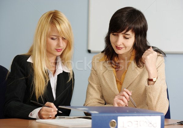 Blonde and brunette women in the office Stock photo © pekour