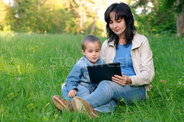 Mãe filho laptop ao ar livre verão Foto stock © pekour