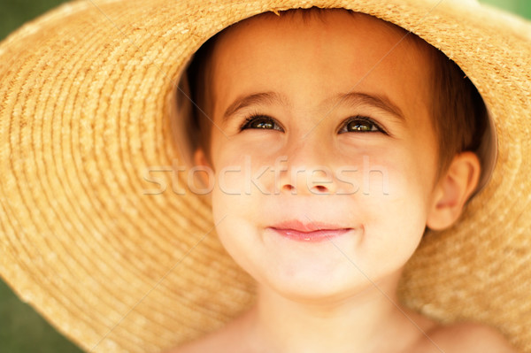 Little boy in straw hat Stock photo © pekour