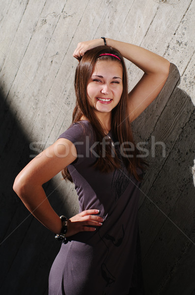 Fashion model by the concrete wall Stock photo © pekour
