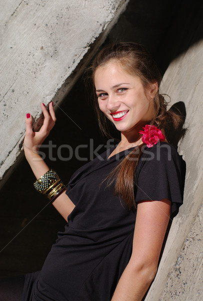 Fashion model lean by the concrete wall Stock photo © pekour
