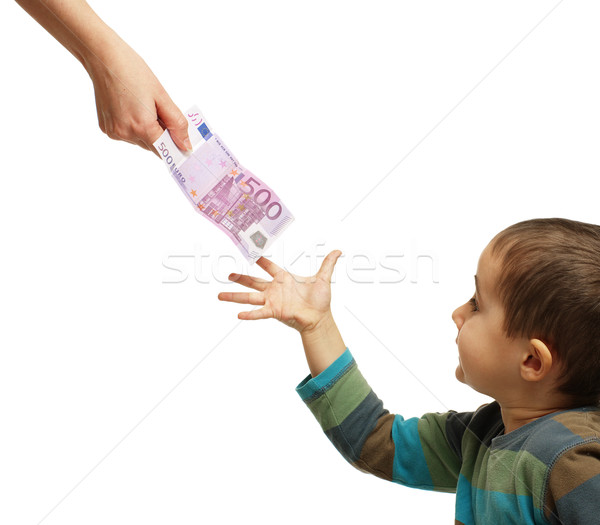 Mom gives pocket money to his son Stock photo © pekour