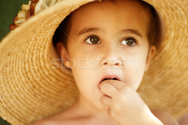 Pequeno menino chapéu de palha ao ar livre cara seis Foto stock © pekour