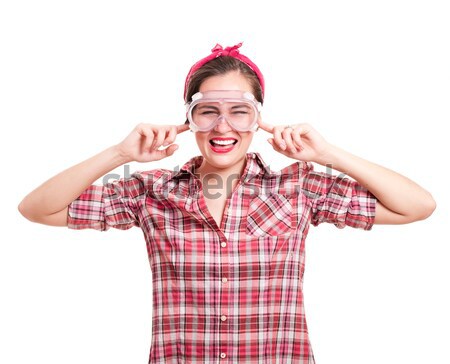 Woman stops her ears from unbearable construction noise Stock photo © pekour