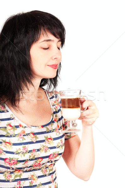 Stock photo: Beautiful brunette woman smells cappuccino