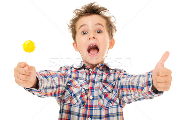 Pequeno gritando animado menino polegar para cima Foto stock © pekour