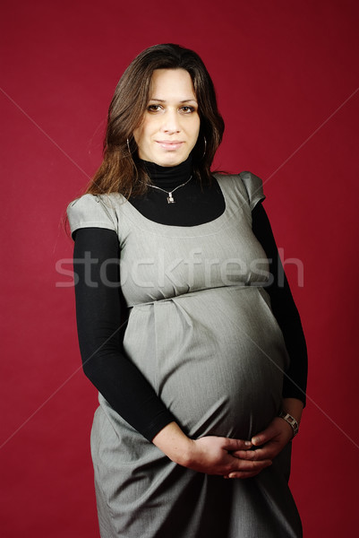 Retrato mulher grávida vermelho grávida Foto stock © pekour