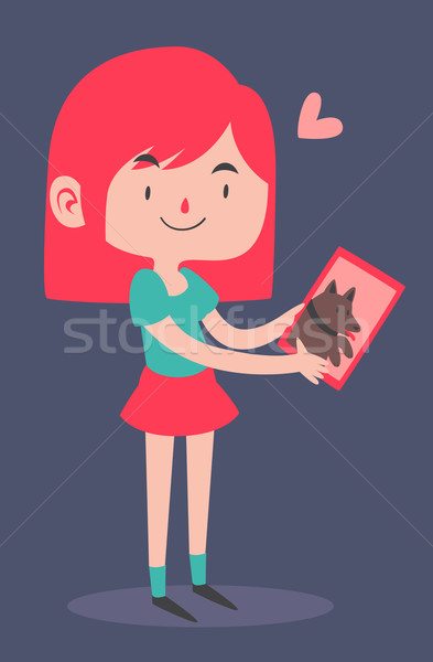 Cute Girl Holding a Portrait of her Dog Stock photo © penguinline